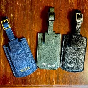 - New Tumi luggage tag  Mint Condition. Black, Sage, Blue Available